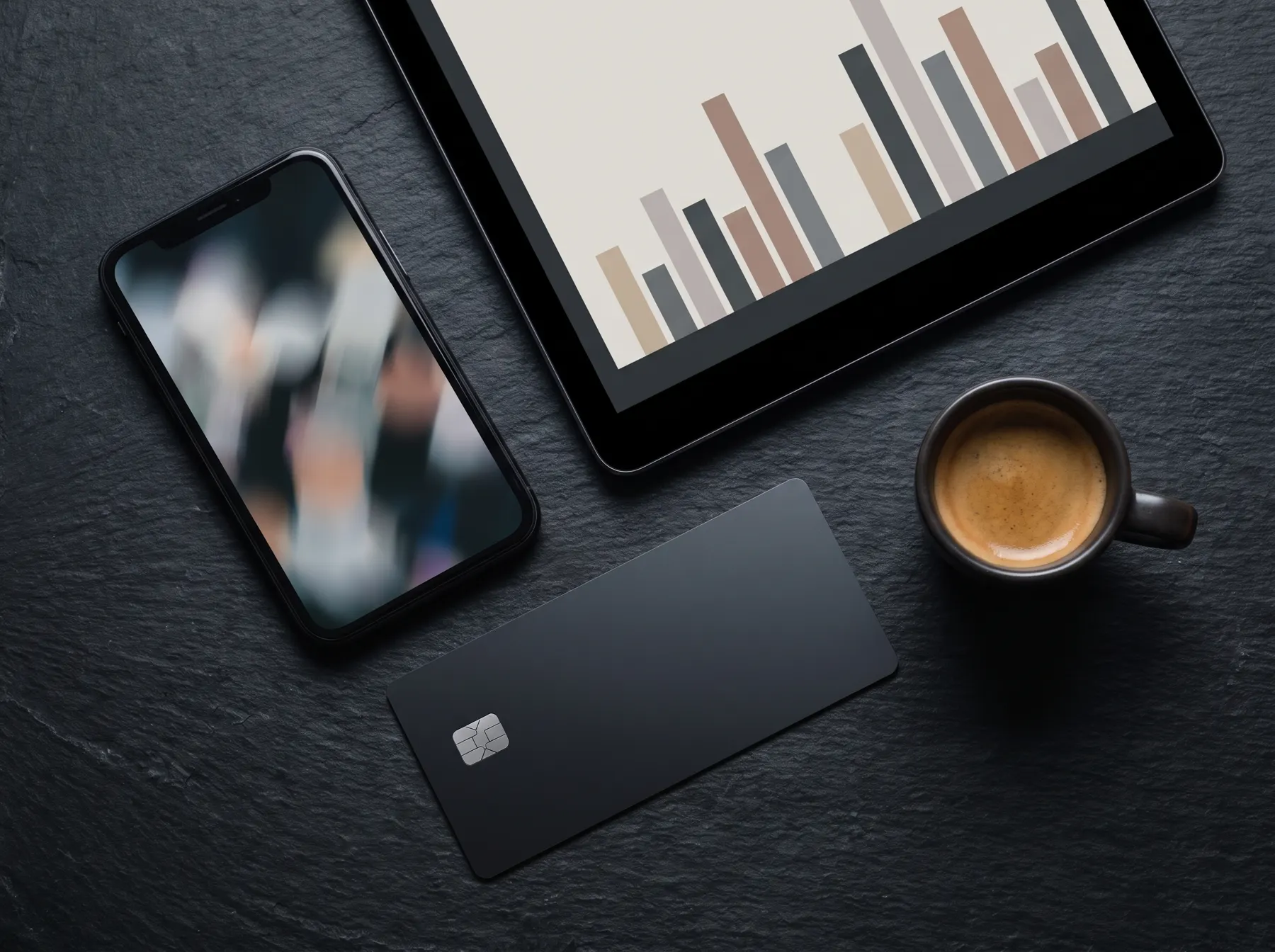 Flat lay of a phone with a social feed and a tablet with ad performance charts