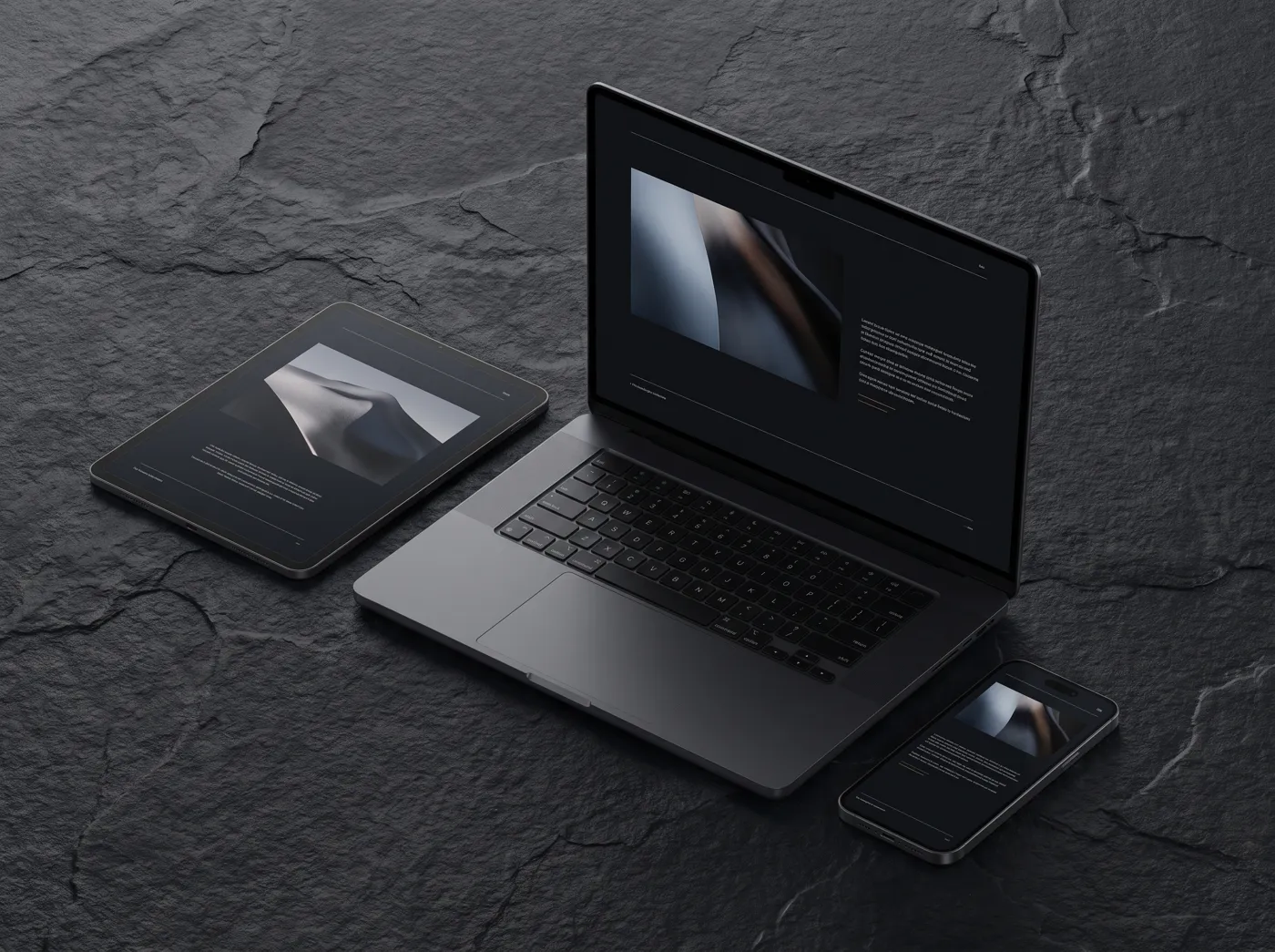 Laptop, tablet, and phone showing a modern website